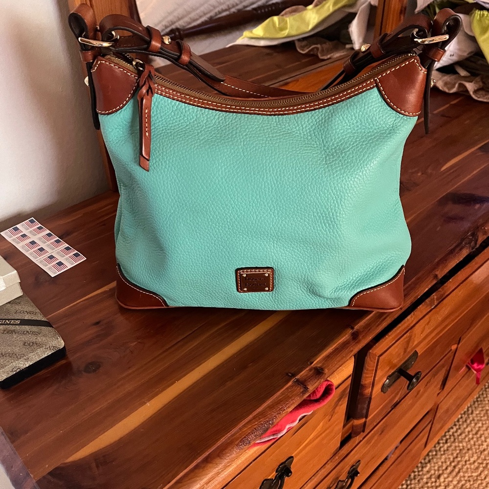 Dooney and Bourke pebble never used